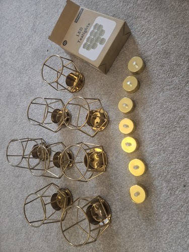 Gold candle holders and - candle,